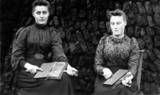 Two women carding