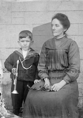 Unknown woman with small boy