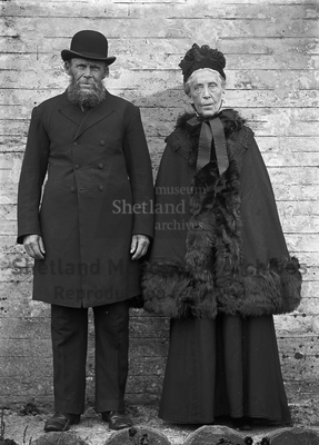 Old man and wife dressed in Black