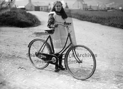 Girl with pushbike at Stove