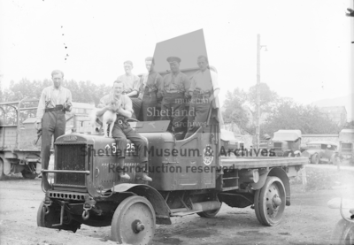 Officers onboard R.A.F. lorry