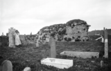 Pre-reformation church ruin, and modern graveyard