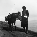 Betty Gray  leading a pony