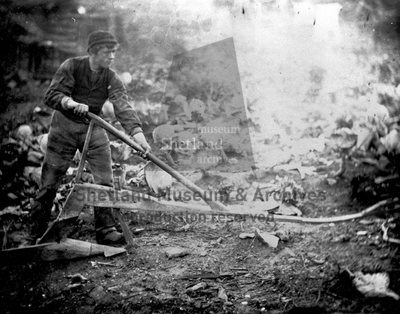 Man with Shetland plough