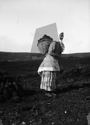 Woman with Kishie of peats