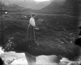 Woman fishing with rod at Voe