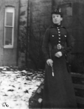 Woman in army-style uniform