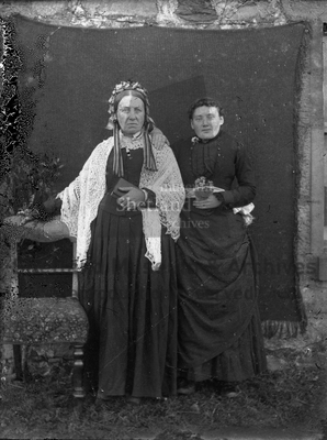 Two women standing