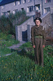 Soldier standing in front garden