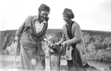 Two women with seal, Spiggie, Dunrossness