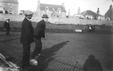 Group playing bowls