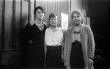 Three unknown women in office interior