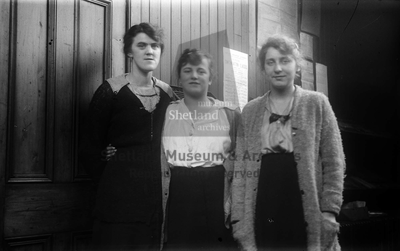 Three unknown women in office interior