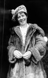 Woman in fur coat and fair isle beret