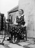 Woman sitting outside spinning