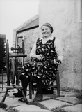 Woman sitting outside spinning