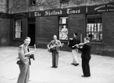 Band playing outside Shetland Times office