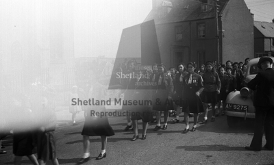 Girl Guides marching at top of Queen's Lane
