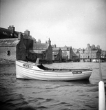 Boat in front of Lodberries, Lerwick